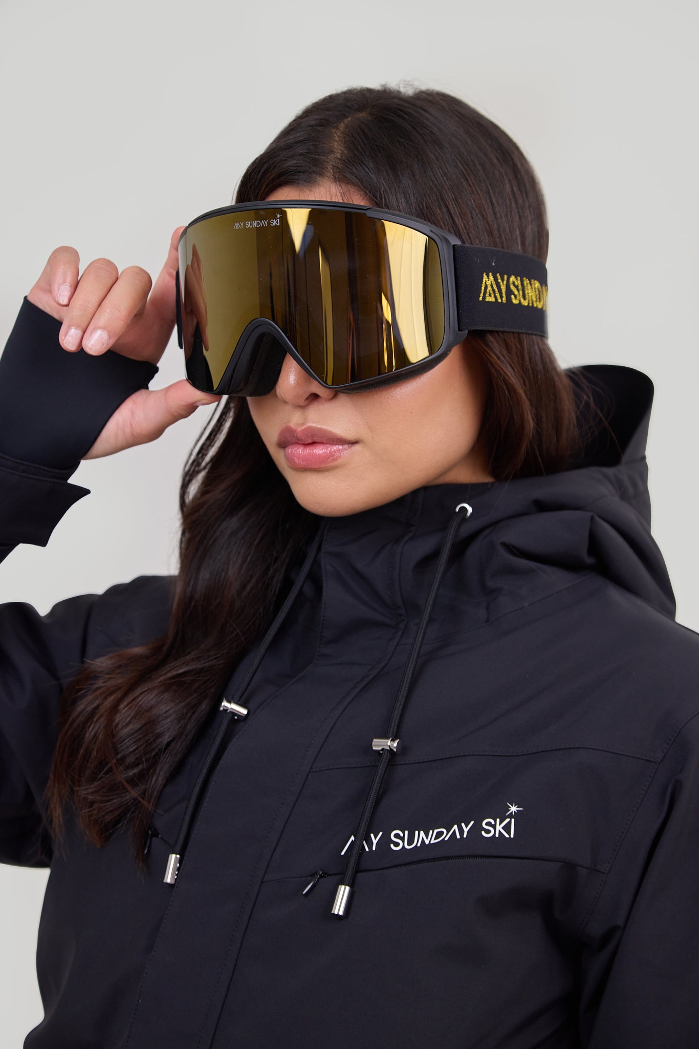 gold ski goggles Celestial Goggles: Black Strap / Gray Gold Lens